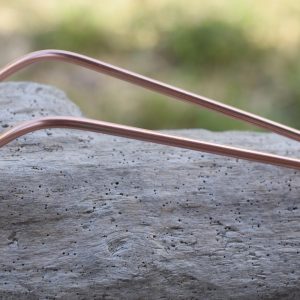 Curved copper hair pin